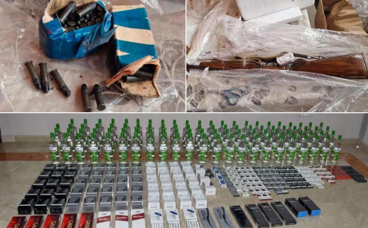 Külli miqdarda siqaretlər, spirtli içkilər və yivli odlu silah aşkar edilib 