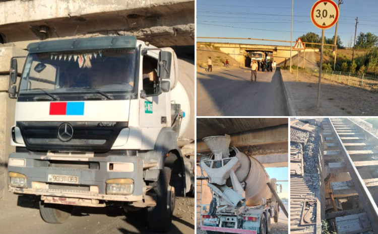 Yük avtomobili ötürücüdə ilişdi, dəmir yolu xətti bağlandı 
