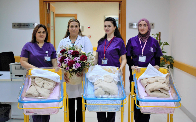 Triplets at the Central Customs Hospital Discharged Home in Good Health 